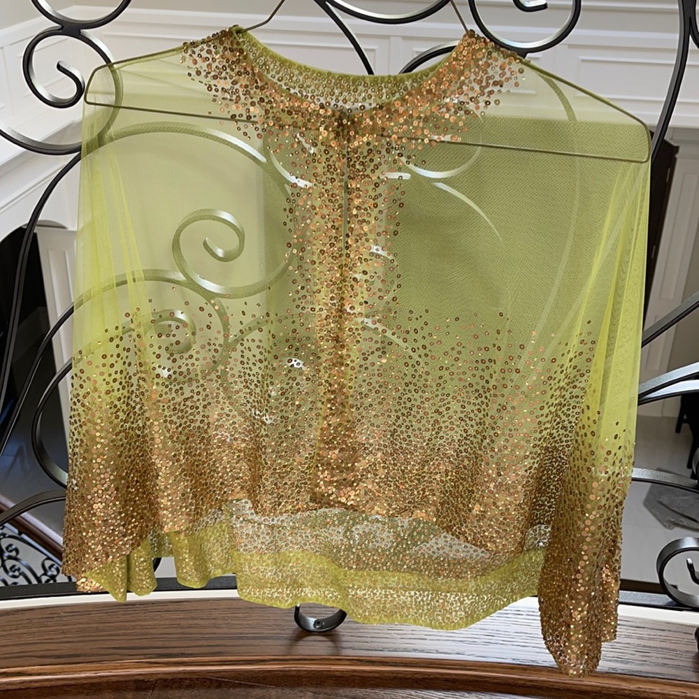 Green cape with gold design